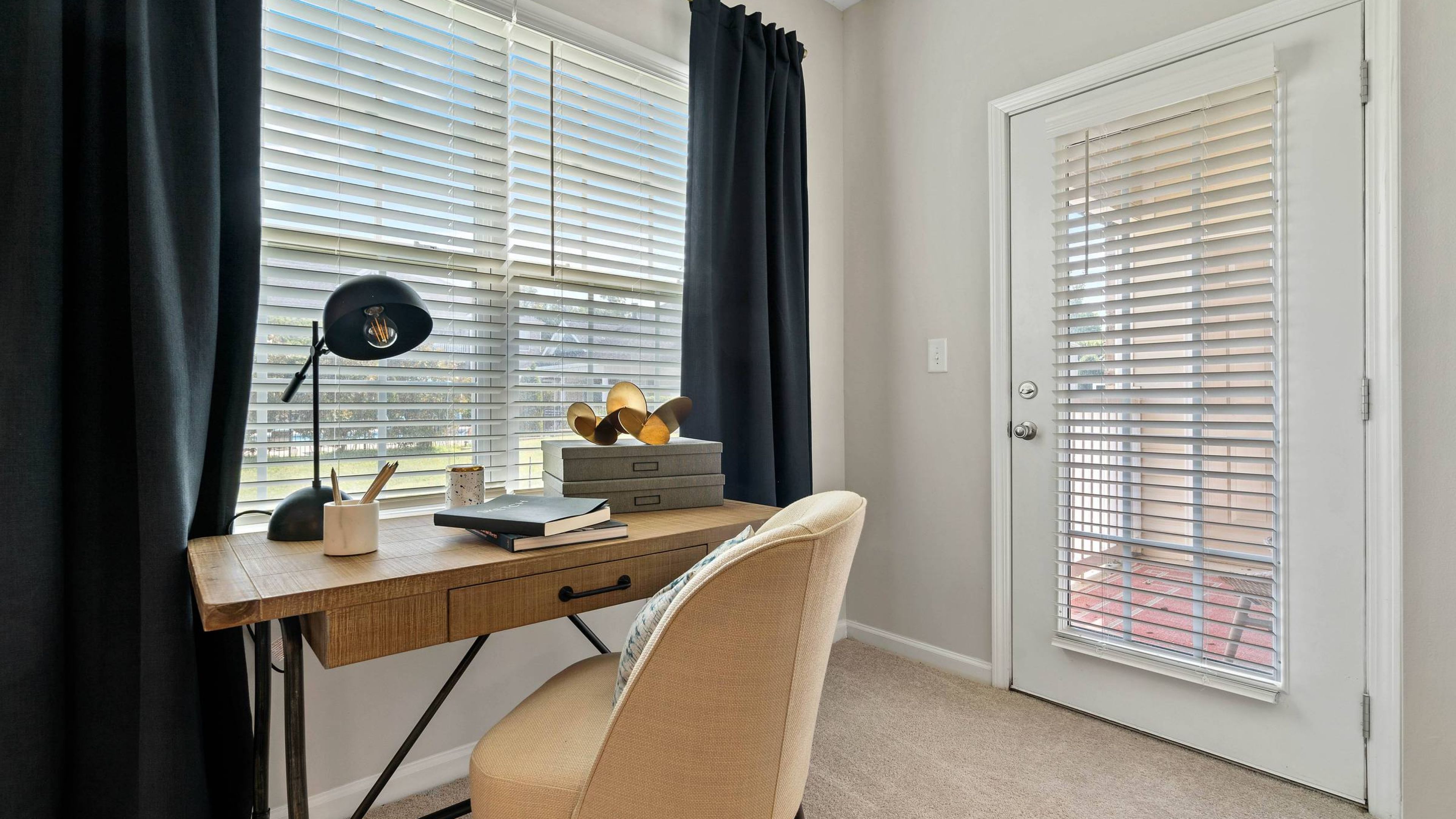 Hawthorne at Horse Pen Creek apartment community exterior and luxury outdoor pool with lounge chairs and surrounding seating