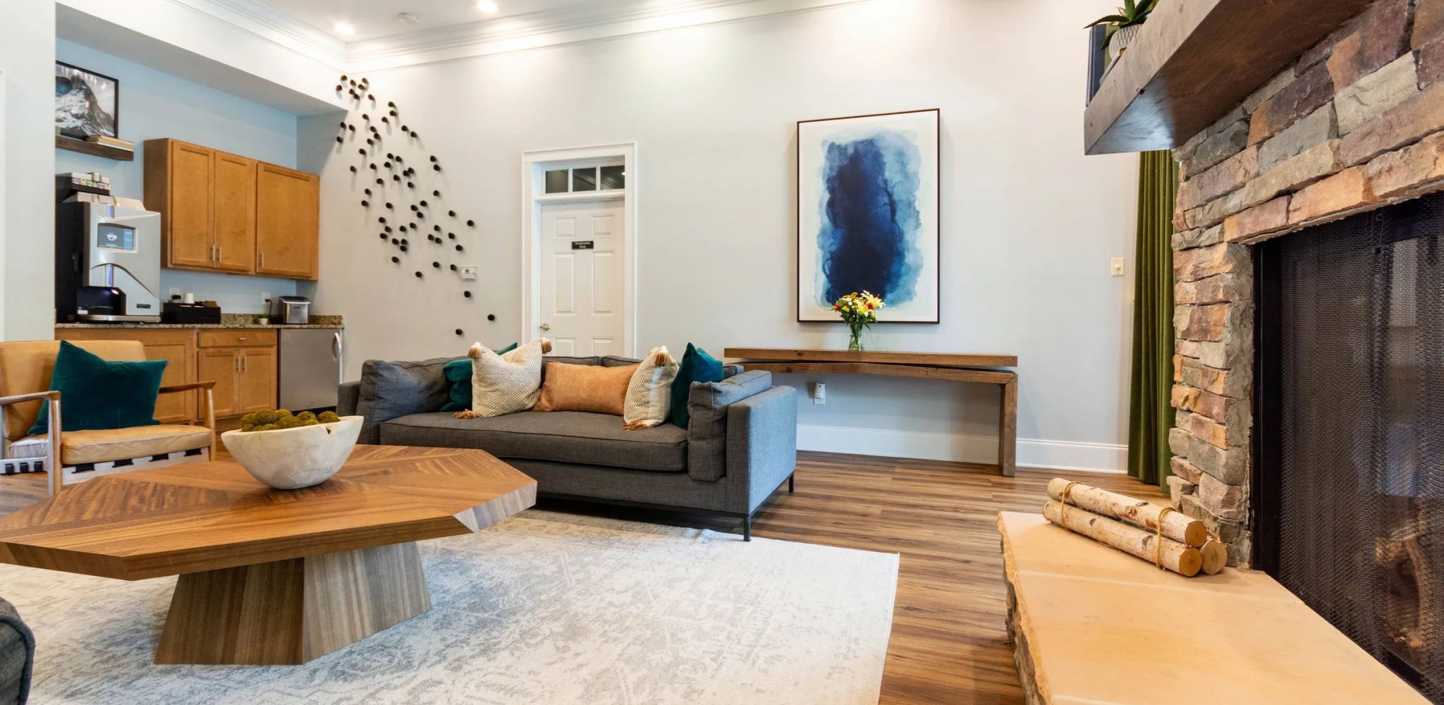 Hawthorne at Horse Pen Creek apartment patio with a view of community exterior, large green lawn and outdoor pool area